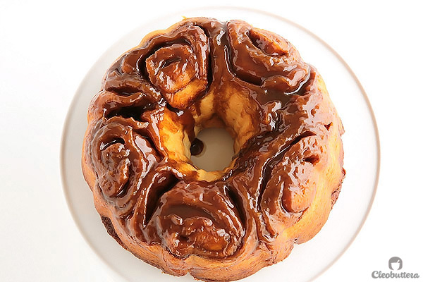 Cinnamon Roll Monkey Bread - A delectable merge of two classics. Soft and feathery cinnamon rolls baked on a bed of caramel sauce in a bundt pan, a la monkey bread style.