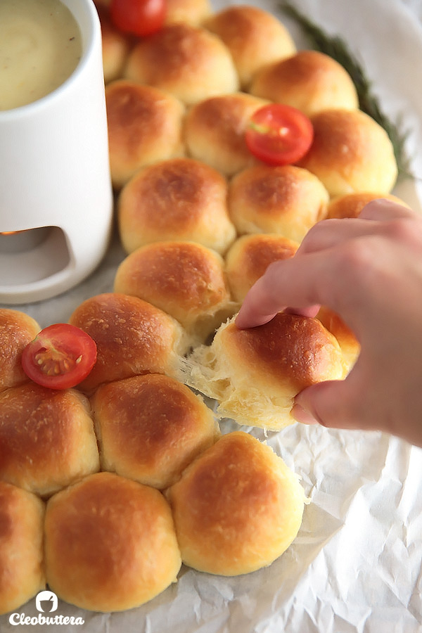Ring around a Rolls -Bite-sized dinner rolls ring served with a cheese fondue dip. Perfect for the holidays and special occasions!