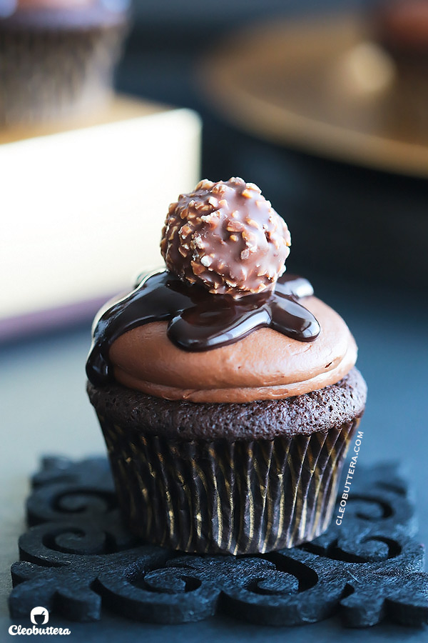 Nutella Lava Cupcakes {Exploding with Nutella flavor! These tender chocolate cupcakes have a Nutella sauce lava center and topped with the Nutella-iest frosting you will ever meet, that does NOT having a speck of powdered sugar}