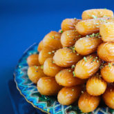 Grandma's Balah El Sham {Middle Eastern fluted fritters. This syrup soaked, churro-like pastry is crunchy on the outside and irresistibly squishy soft and fluffy on the inside.