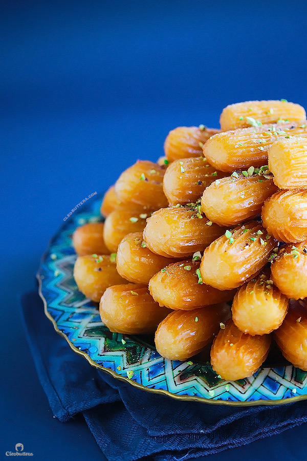 Grandma's Balah El Sham {Middle Eastern fluted fritters. This syrup soaked, churro-like pastry is crunchy on the outside and irresistibly squishy soft and fluffy on the inside.