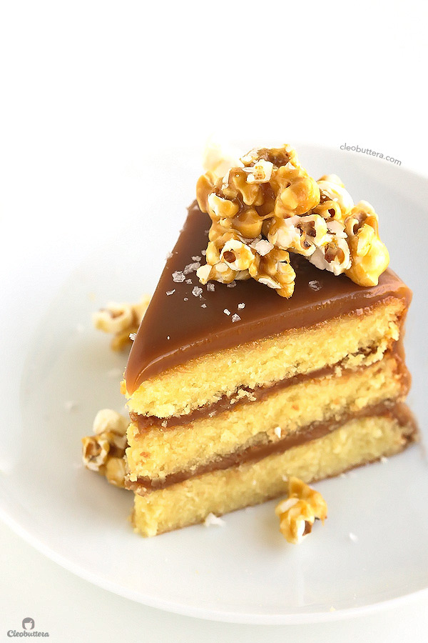 The best yellow cake you've ever had, filled and covered with the creamiest, southern-style caramel icing, sprinkled with sea salt and optional salted caramel popcorn!