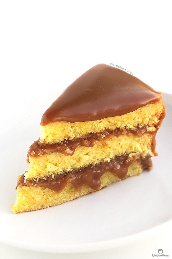 The best yellow cake you've ever had, filled and covered with the creamiest, southern-style caramel icing, sprinkled with sea salt and optional salted caramel popcorn!