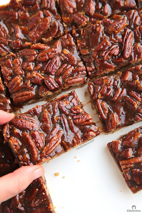 You won’t be able to stop eating these! They are so EASY to make and too dangerous to have around. BEST EVER pecan bars!
