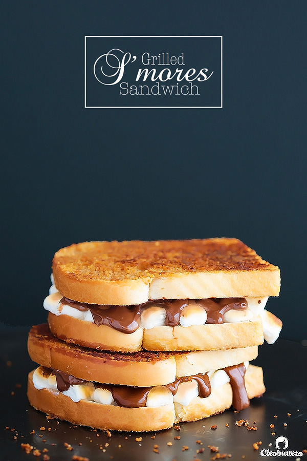 Grilled S'mores Sandwich - Graham cracker crusted bread slices sandwiching gooey roasted marshmallows and melted milk chocolate. Insanely delicious!