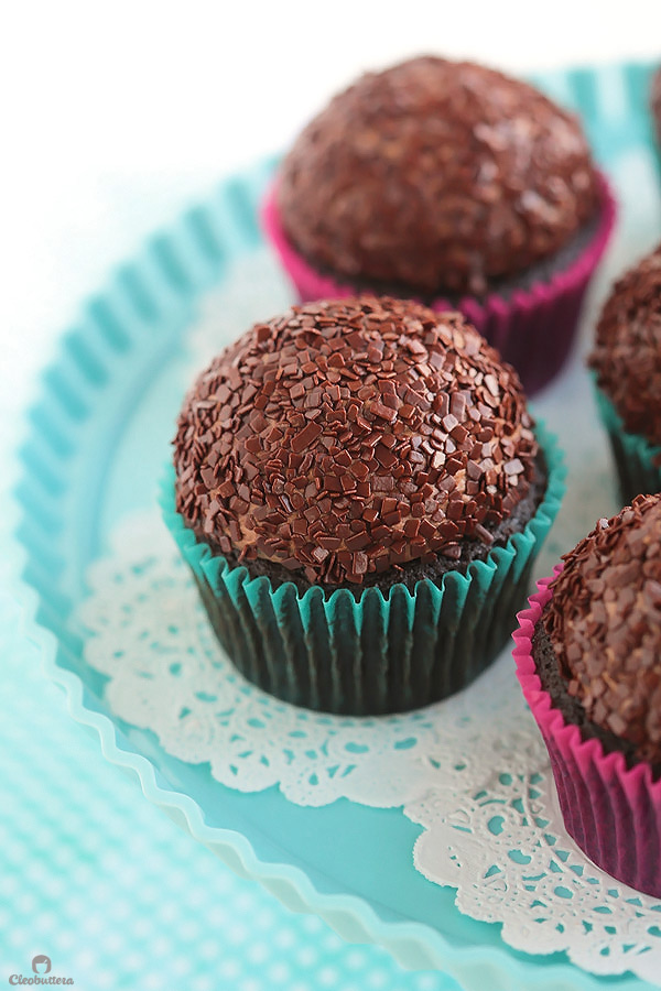 Light and fluffy, moist chocolate cupcake topped with a cloud-like Italian meringue chocolate buttercream and dipped in French chocolate sprinkles. The whole experience is like biting into a chocolate cloud. (Inspired by Kara’s Cupcakes famous Chocolate Velvet Cupcake)