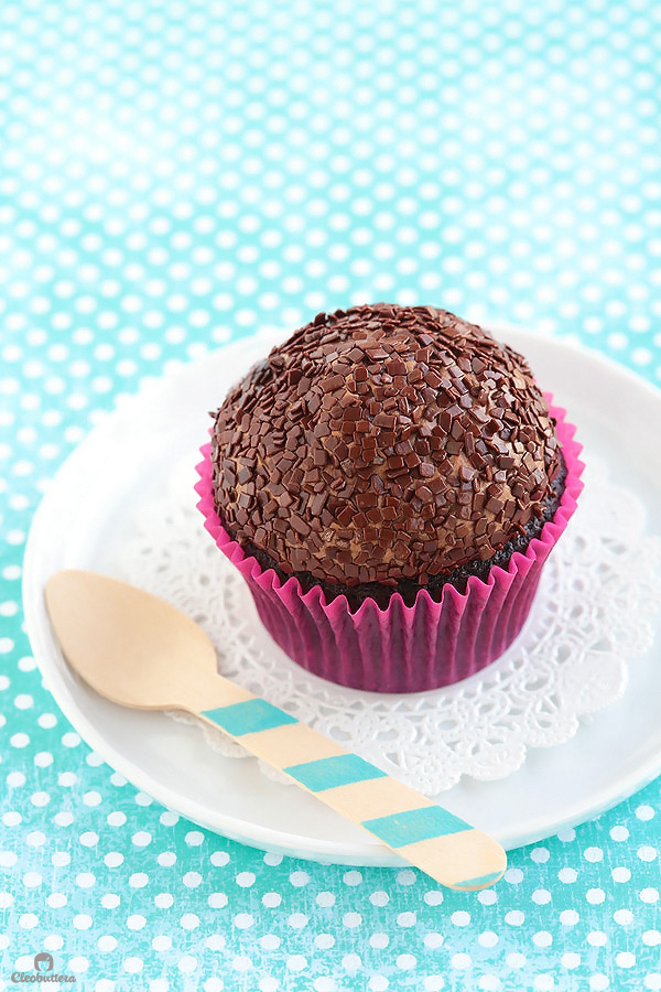 Light and fluffy, moist chocolate cupcake topped with a cloud-like Italian meringue chocolate buttercream and dipped in French chocolate sprinkles. The whole experience is like biting into a chocolate cloud. (Inspired by Kara’s Cupcakes famous Chocolate Velvet Cupcake)