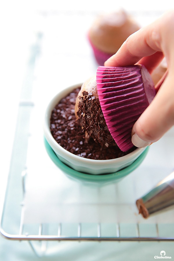 Light and fluffy, moist chocolate cupcake topped with a cloud-like Italian meringue chocolate buttercream and dipped in French chocolate sprinkles. The whole experience is like biting into a chocolate cloud. (Inspired by Kara’s Cupcakes famous Chocolate Velvet Cupcake)