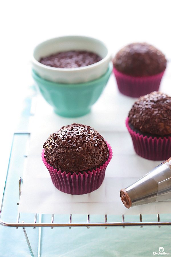 Light and fluffy, moist chocolate cupcake topped with a cloud-like Italian meringue chocolate buttercream and dipped in French chocolate sprinkles. The whole experience is like biting into a chocolate cloud. (Inspired by Kara’s Cupcakes famous Chocolate Velvet Cupcake)