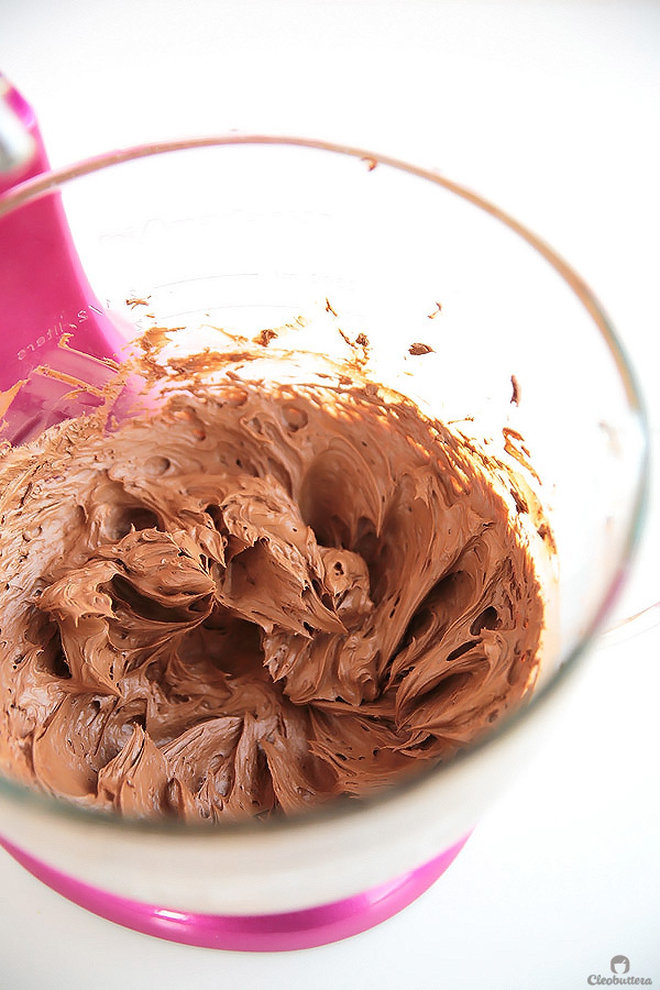 Step-by-step tutorial on how to make this fluffy, mousse-like, light-as-air chocolate buttercream, that feels like biting into a chocolate cloud.
