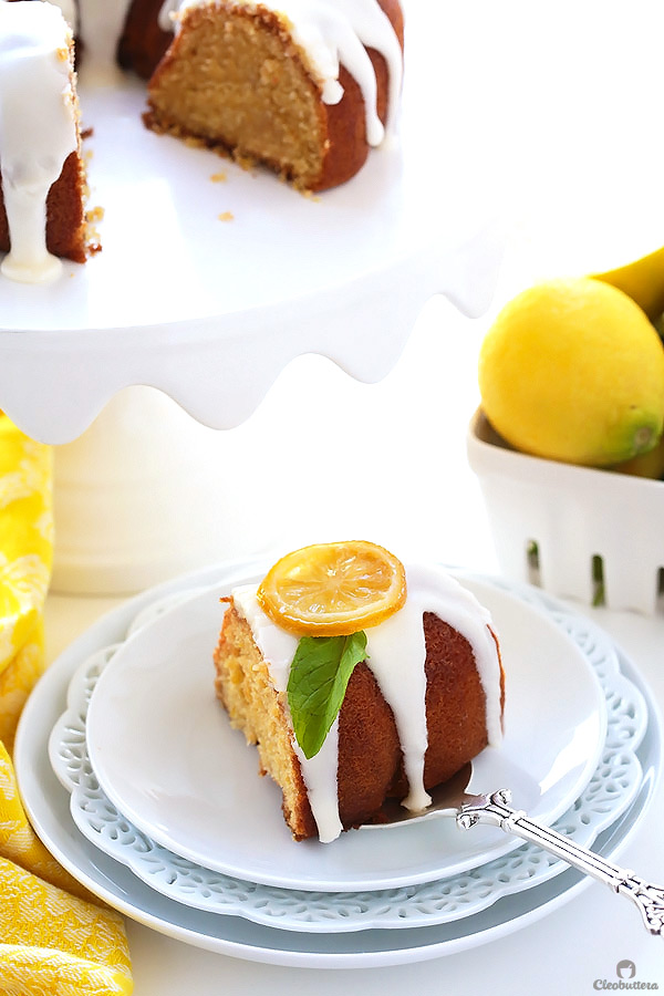 This quadruple lemon bundt cake is as lemony as it gets! A tender sour cream cake is filled with bursts of lemon zest, then brushed with lemon syrup, glazed with lemon cream cheese icing and adorned with candied lemon slices. It’s melt-in-the-mouth refreshing (Poppy seeds are more than welcome here!)