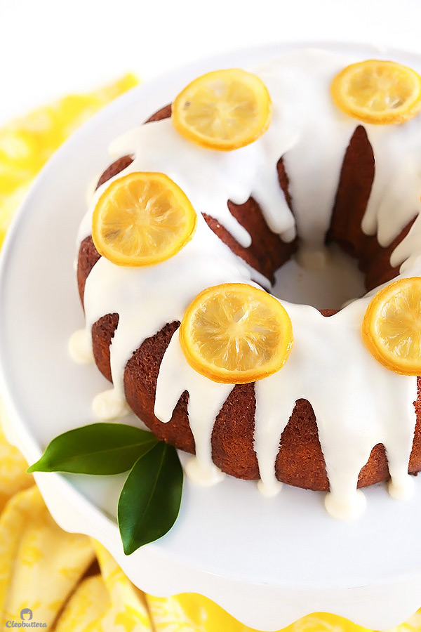 This quadruple lemon bundt cake is as lemony as it gets! A tender sour cream cake is filled with bursts of lemon zest, then brushed with lemon syrup, glazed with lemon cream cheese icing and adorned with candied lemon slices. It’s melt-in-the-mouth refreshing (Poppy seeds are more than welcome here!)