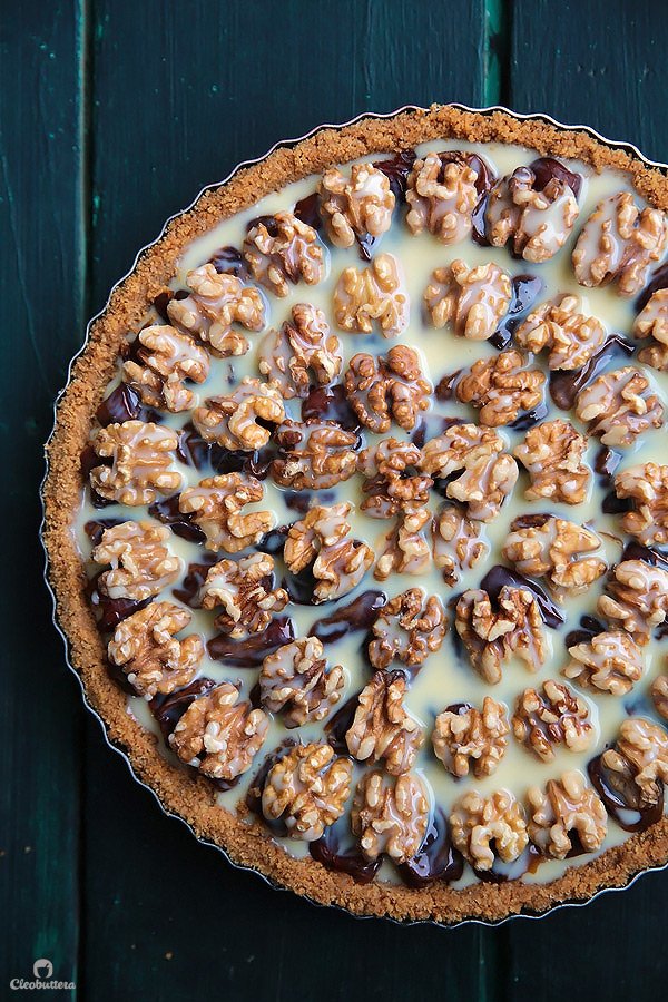 This tart could not be easier or more delicious! Cinnamon spiced digestive biscuit crust, layered with soft dates, walnuts and caramelized condensed milk. Heavenly!