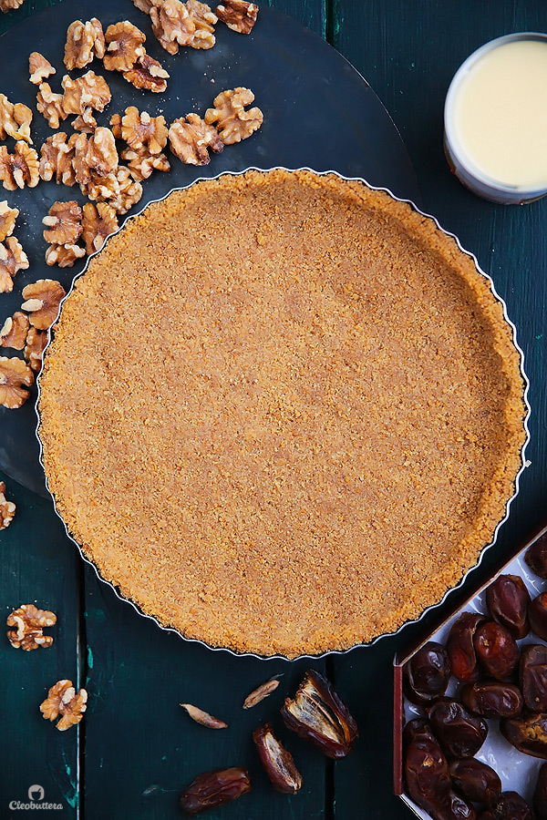 This tart could not be easier or more delicious! Cinnamon spiced digestive biscuit crust, layered with soft dates, walnuts and caramelized condensed milk. Heavenly!