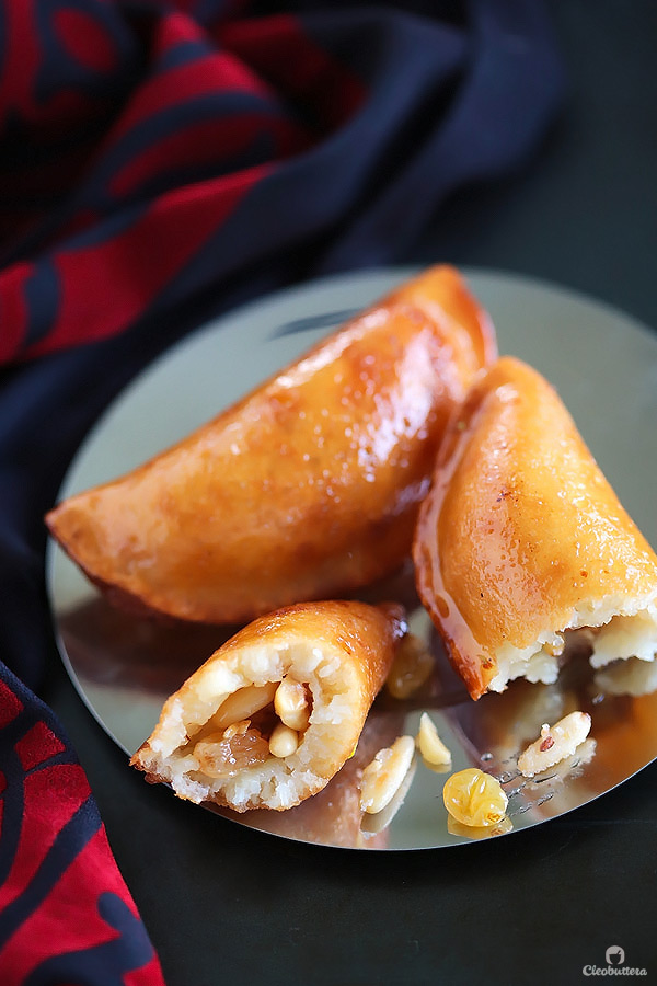 A Middle Eastern favorite, traditionally served during the month of Ramadan! Made from a type of yeasted pancakes stuffed with nuts, fried to crunchy, golden perfection, then doused in simple syrup.