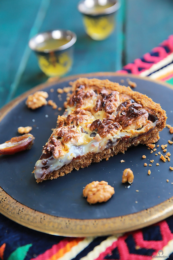 This tart could not be easier or more delicious! Cinnamon spiced digestive biscuit crust, layered with soft dates, walnuts and caramelized condensed milk. Heavenly!