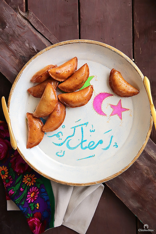 A Middle Eastern favorite, traditionally served during the month of Ramadan! Made from a type of yeasted pancakes stuffed with nuts, fried to crunchy, golden perfection, then doused in simple syrup.