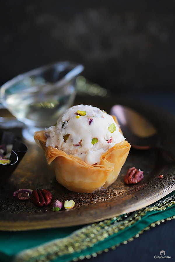 A fun summer spin on the Mediterranean favorite! Crispy phyllo cup sweetened with cinnamon honey syrup, topped with a scoop of an easy to make candied nuts cinnamon ice cream.
