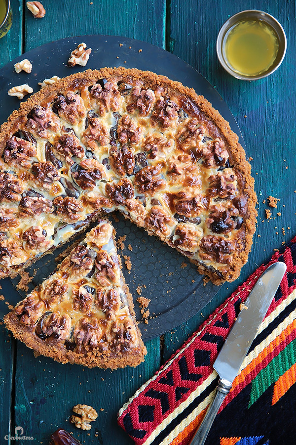 This tart could not be easier or more delicious! Cinnamon spiced digestive biscuit crust, layered with soft dates, walnuts and caramelized condensed milk. Heavenly!