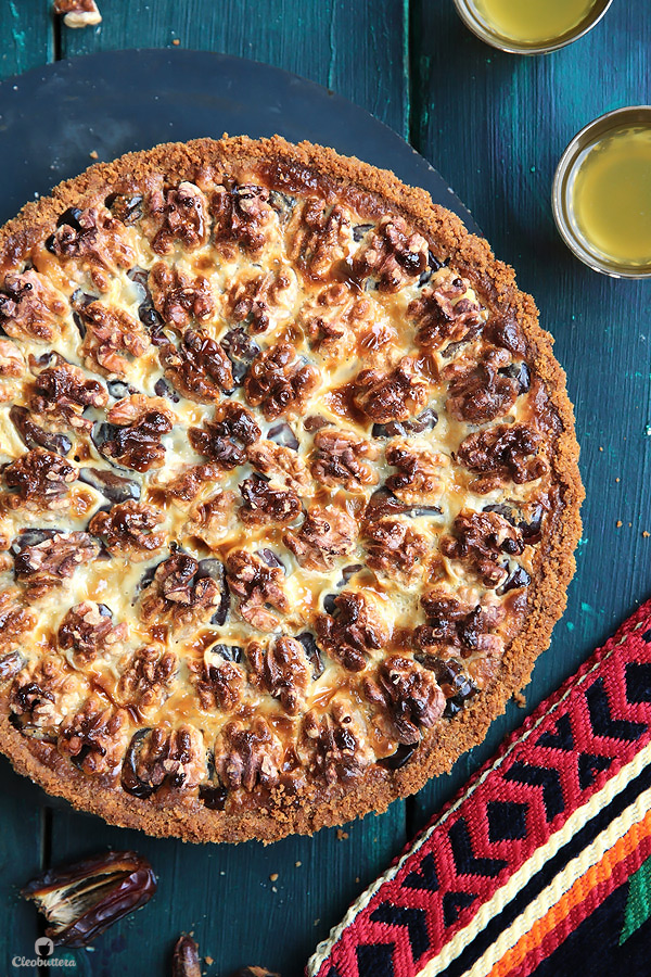 This tart could not be easier or more delicious! Cinnamon spiced digestive biscuit crust, layered with soft dates, walnuts and caramelized condensed milk. Heavenly!