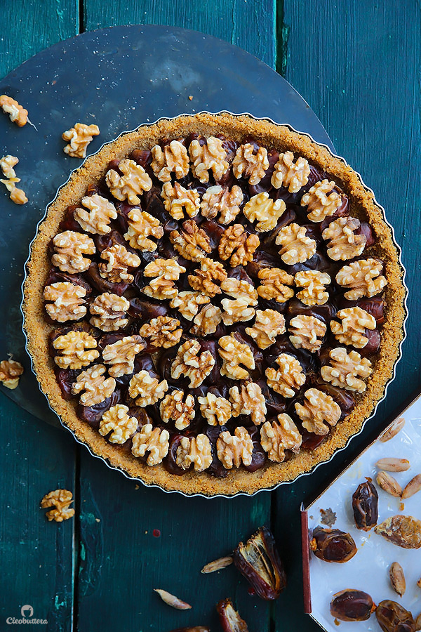 This tart could not be easier or more delicious! Cinnamon spiced digestive biscuit crust, layered with soft dates, walnuts and caramelized condensed milk. Heavenly!