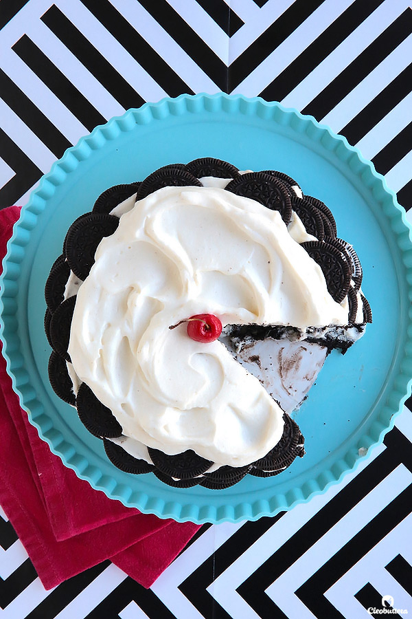 Alternating layers of Oreos and Oreo filling-flavored whipped cream make up for one incredibly EASY and delicious cake! This NO BAKE dessert, soften as it sits in the refrigerator and transforms into a cake that tastes like a cross between a giant soft Oreo and an ice cream sandwich. SO GOOD!