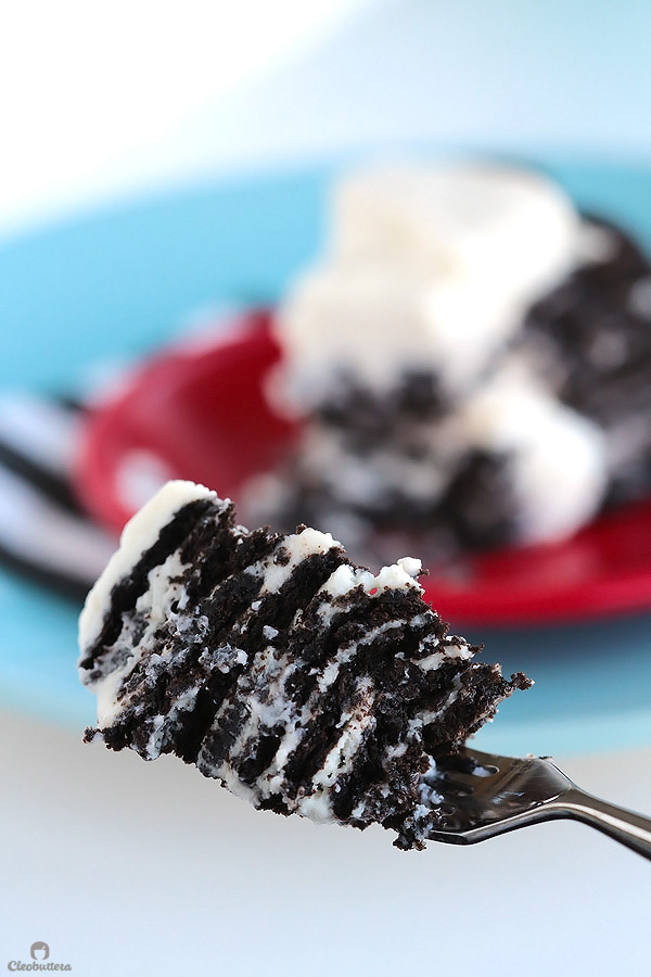 Alternating layers of Oreos and Oreo filling-flavored whipped cream make up for one incredibly EASY and delicious cake! This NO BAKE dessert, soften as it sits in the refrigerator and transforms into a cake that tastes like a cross between a giant soft Oreo and an ice cream sandwich. SO GOOD!