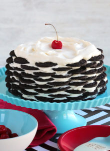 Alternating layers of Oreos and Oreo filling-flavored whipped cream make up for one incredibly EASY and delicious cake! This NO BAKE dessert, soften as it sits in the refrigerator and transforms into a cake that tastes like a cross between a giant soft Oreo and an ice cream sandwich. SO GOOD!