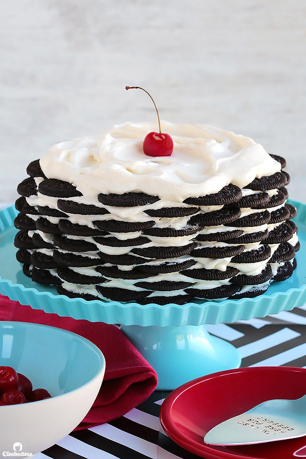 Alternating layers of Oreos and Oreo filling-flavored whipped cream make up for one incredibly EASY and delicious cake! This NO BAKE dessert, soften as it sits in the refrigerator and transforms into a cake that tastes like a cross between a giant soft Oreo and an ice cream sandwich. SO GOOD!