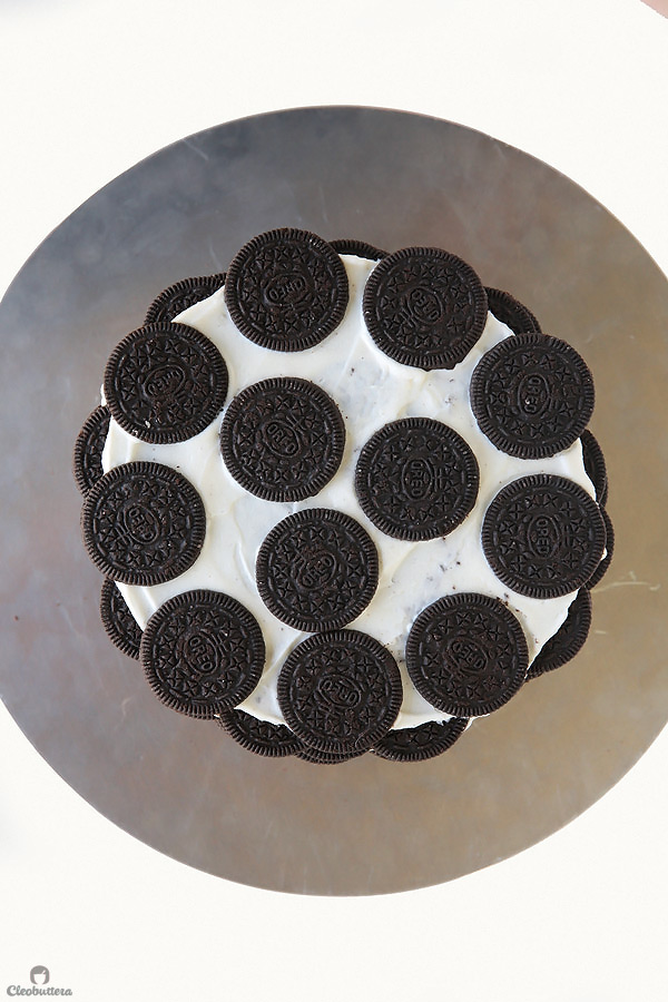 Alternating layers of Oreos and Oreo filling-flavored whipped cream make up for one incredibly EASY and delicious cake! This NO BAKE dessert, soften as it sits in the refrigerator and transforms into a cake that tastes like a cross between a giant soft Oreo and an ice cream sandwich. SO GOOD!