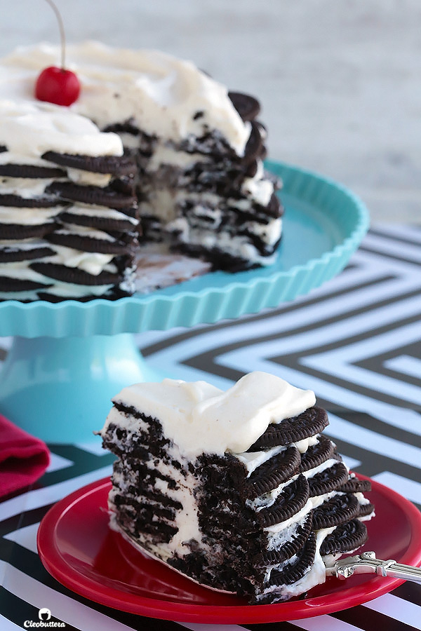 Alternating layers of Oreos and Oreo filling-flavored whipped cream make up for one incredibly EASY and delicious cake! This NO BAKE dessert, soften as it sits in the refrigerator and transforms into a cake that tastes like a cross between a giant soft Oreo and an ice cream sandwich. SO GOOD!