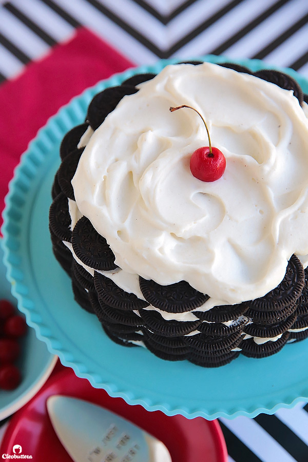 Alternating layers of Oreos and Oreo filling-flavored whipped cream make up for one incredibly EASY and delicious cake! This NO BAKE dessert, soften as it sits in the refrigerator and transforms into a cake that tastes like a cross between a giant soft Oreo and an ice cream sandwich. SO GOOD!