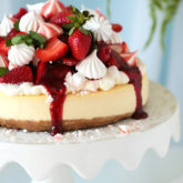Your search for the perfect baked cheesecake ends here!  Incomparably creamy and velvety with just the right amount of tang, sweetness and density.  A wonderful contrast to a crunchy crust that doesn't turn soggy.  Serve plain from the ultimate classic or give it an Eton Mess twist with strawberry topping, meringue kisses and whipped cream!