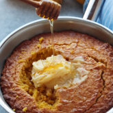 Rich and moist cornbread with an amplified corn flavor that comes from using real corn purée in the batter.  It's beautifully sweet, a little savory and ooh so good with whipped honey butter! 