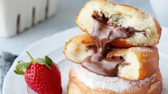 Soft and pillowy donuts, exploding with a river of Nutella.  One of the best donuts you could ever experience!