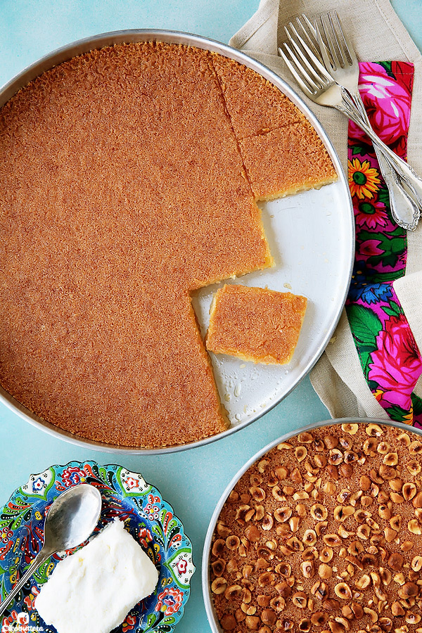 Creamy ricotta cheese wrapped inside golden, crunchy strands of sticky sweet kunafa.  A sprinkling of vibrantly green pistachios add the finishing touch to this handheld delicacy.  Plus...recipe VIDEO included!