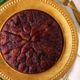 A Middle Eastern classic cake, tweaked to perfection!  Soft and moist vanilla cake topped with lightly candied black dates.  Serve warm for ultimate comfort! 