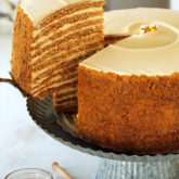The ultimate recipe for Russia's famous Honey Cake, that you're likely to encounter.  Ten layers of soft, caramelized honey cakes that taste like the fine marriage of Lotus biscuits, honey graham crackers and gingerbread cookies, sandwiched between a cloud-like burnt honey and dulce de leche whipped cream.  Unbelievably delicious!