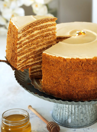 The ultimate recipe for Russia's famous Honey Cake, that you're likely to encounter.  Ten layers of soft, caramelized honey cakes that taste like the fine marriage of Lotus biscuits, honey graham crackers and gingerbread cookies, sandwiched between a cloud-like burnt honey and dulce de leche whipped cream.  Unbelievably delicious!